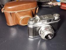 Appareil photo argentique Foca, objectif Neoplar 45 mm f2.8 et tui cuir