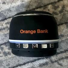 Orange Bank Mini enceinte Bluetooth noire cylindrique avec entre AUX Micro-USB