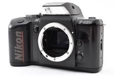 En ltat Appareil photo reflex argentique 35 mm NIKON F-401S Botier...