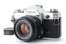 NEAR MINT Appareil photo argentique Canon A-1 A1 SLR 35mm New FD 50mm...