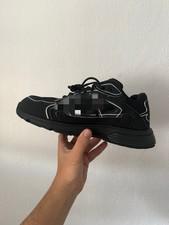 Baskets homme noir et blanc lacets tige basse chaussures sport style baskets