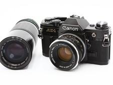 Exc3 Appareil photo argentique Canon AE-1 noir FL 50mm f1.8 NFD...