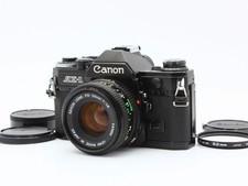 Exc3 Appareil photo reflex argentique 35 mm noir Canon AE-1 nouvel...